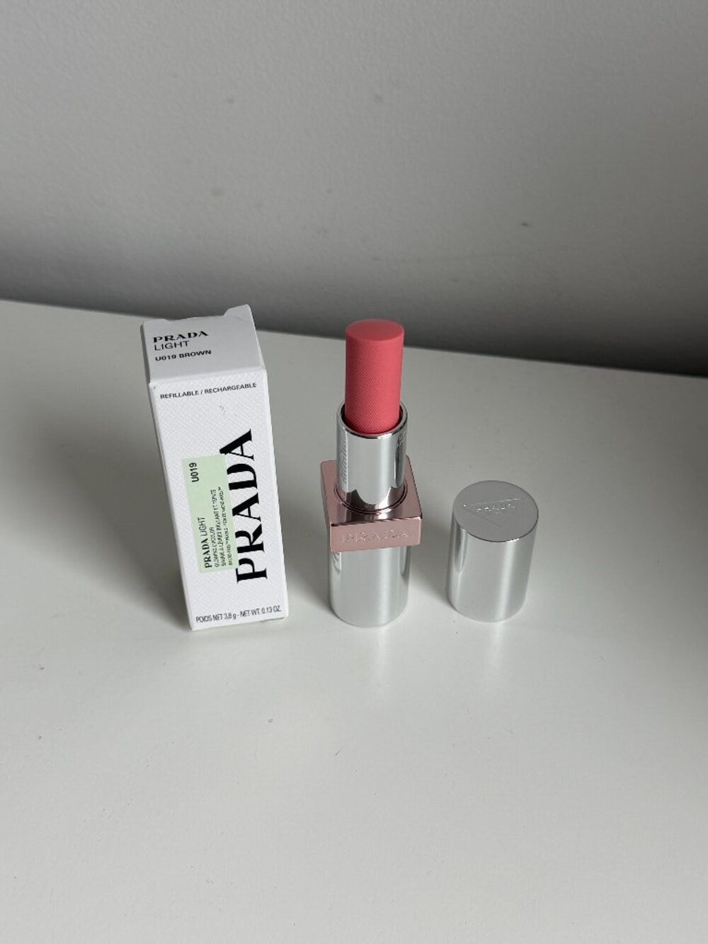 NWT Prada Light Glowing Lip Oil Stick U019 Brown